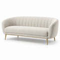 Canapé trois places en tissu beige avec pieds en métal