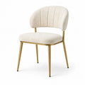 Chaise en tissu bouclé avec cadre en métal doré